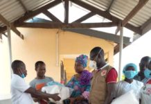Ghana Red Cross Society Donates Theatre Gowns and Facemasks To Damongo Hospital