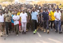Abu Jinapor walks with Security Services at Damongo